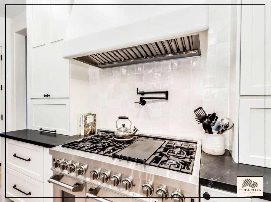 Mediterranean Mist zellige tiles as a kitchen backsplash with stainless steel accents